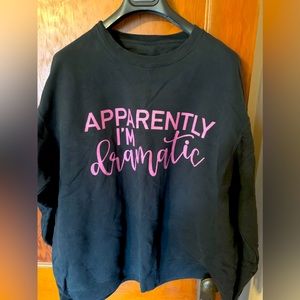 “Apparently I’m Dramatic” crewneck fleece sweatshirt. Black with pink letters.